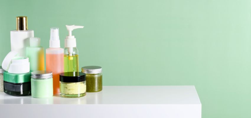 Collection of skincare bottles and jars ready for review with a skincare ingredient checker.