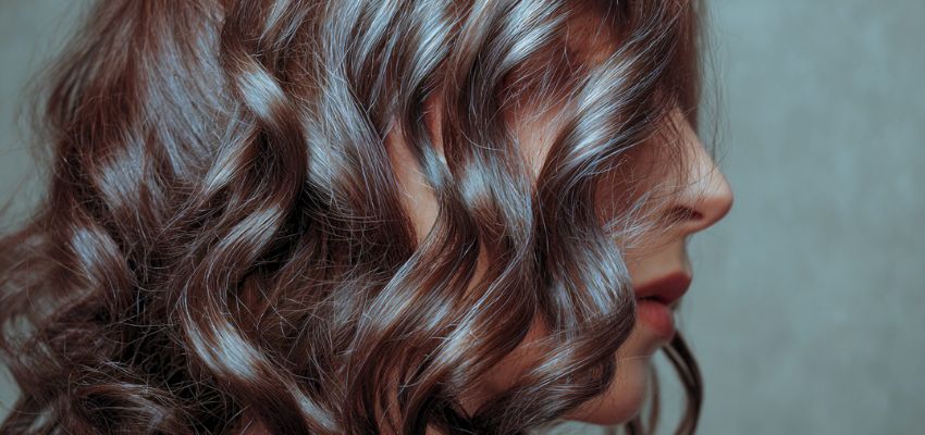 Ash brown hair is a sophisticated, modern take on classic brunette, offering a cool, low-key look.