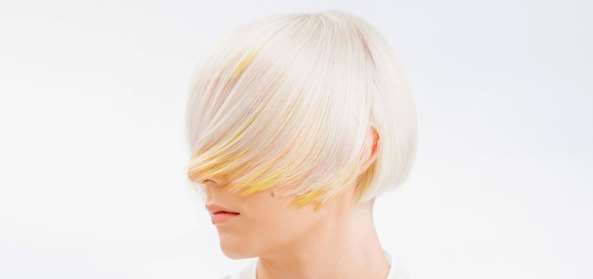 how soon can i bleach my hair again to fix it (1) The woman has bleached hair.