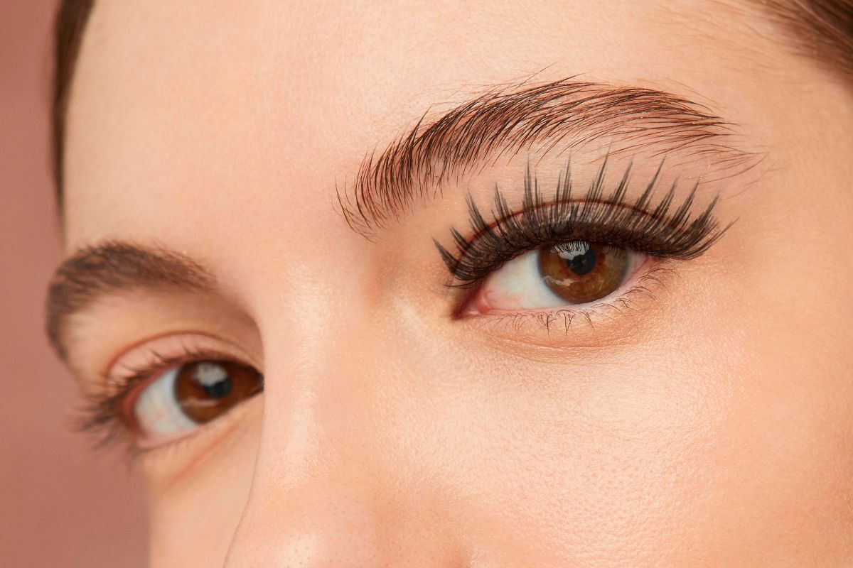 classic-lash-extensions (3) Close-up of beautiful brown eyes enhanced with classic lash extensions for a natural, elegant appearance.