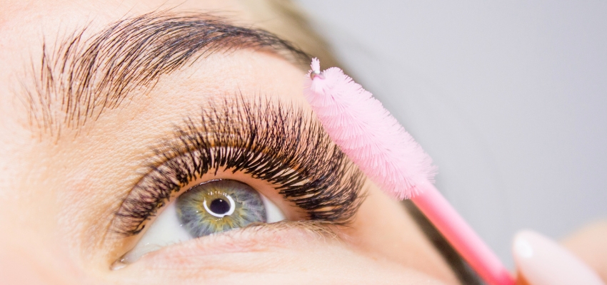 lash-extension-aftercare2 Using a spoolie brush to gently groom lash extensions as part of daily lash extension aftercare.